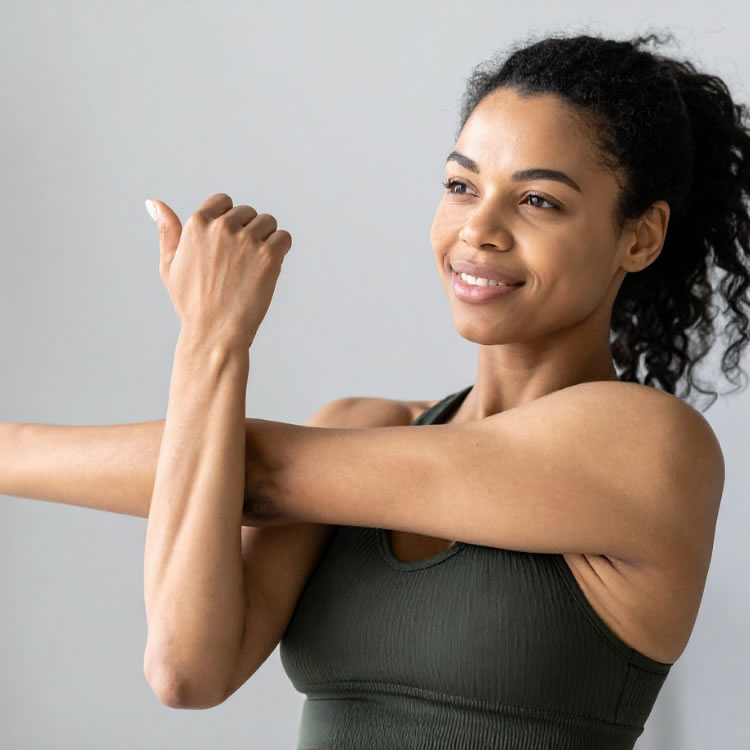 Guided stretching session at Symbios Fit