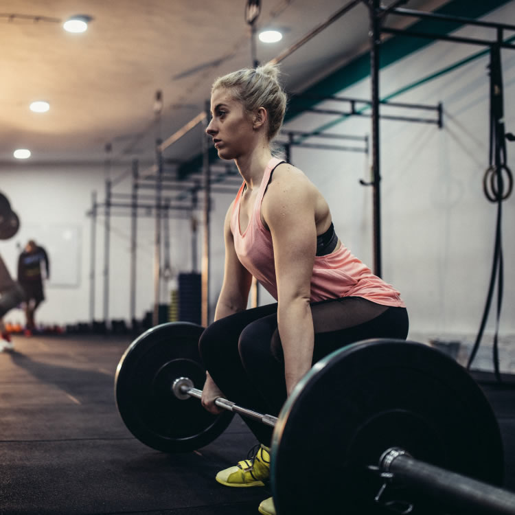 Women's strength training at Symbios Fit